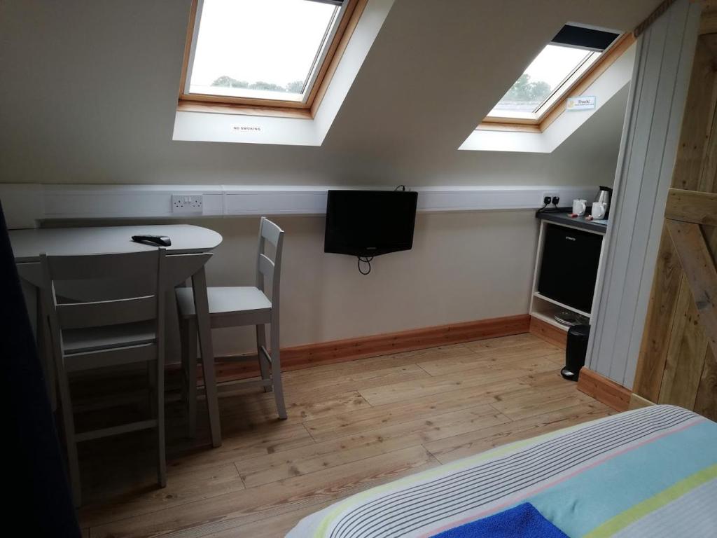 Kuchyň nebo kuchyňský kout v ubytování McHugh's Loft