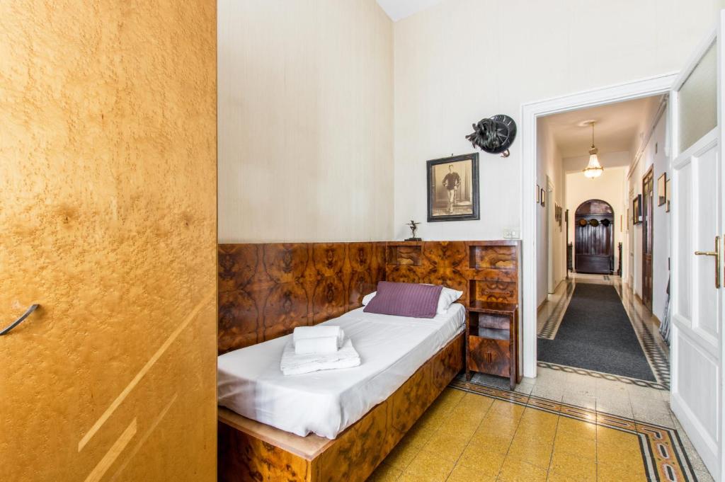 A bed or beds in a room at Trastevere Decò Apartment