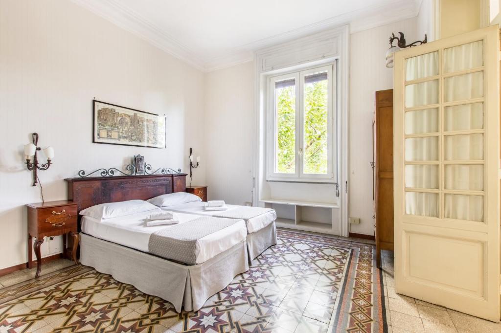A bed or beds in a room at Trastevere Decò Apartment