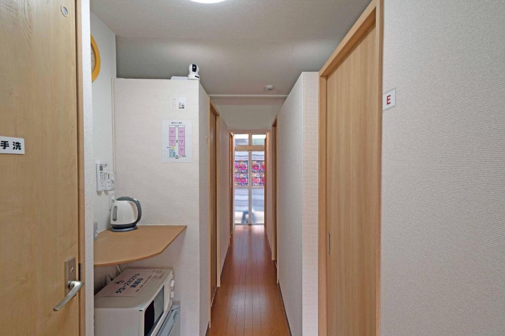 越谷市にあるタローズホステル南越谷の廊下