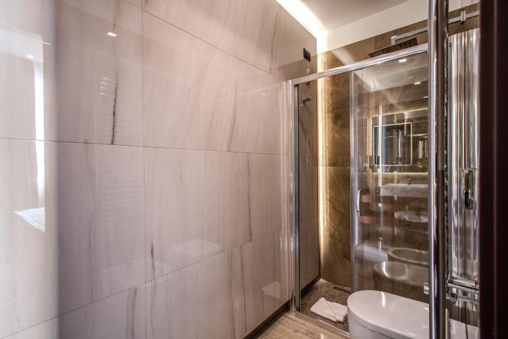 Koupelna v ubytování Doria Palace Boutique Hotel