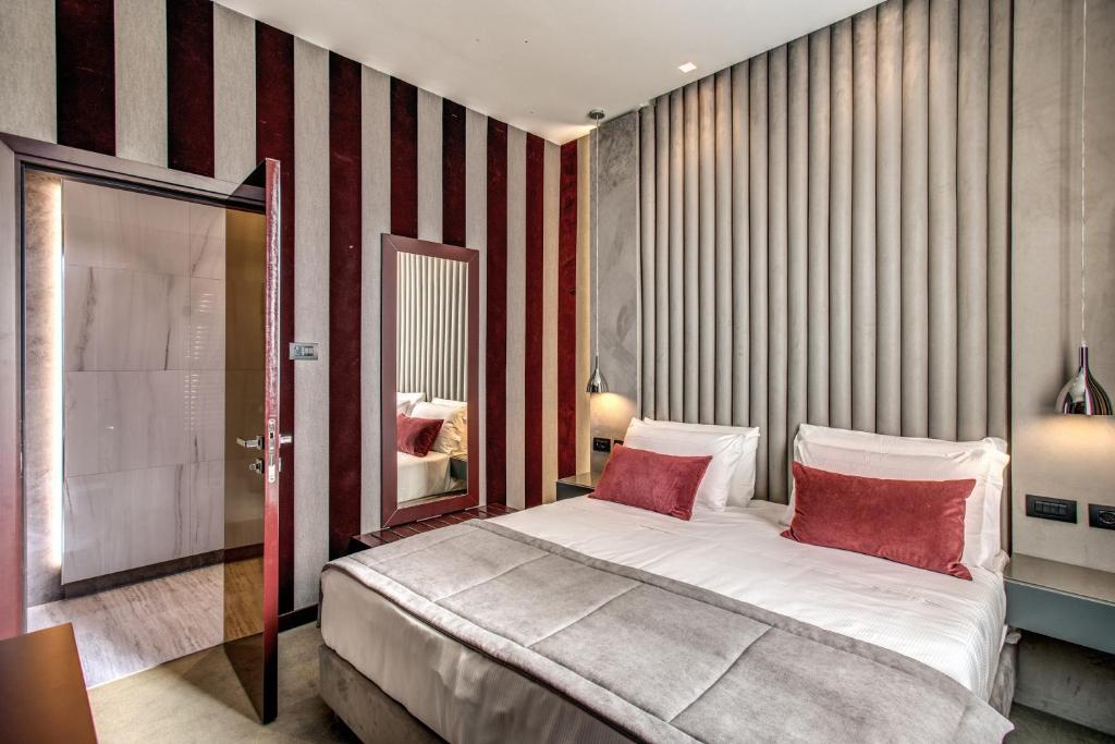 Postel nebo postele na pokoji v ubytování Doria Palace Boutique Hotel
