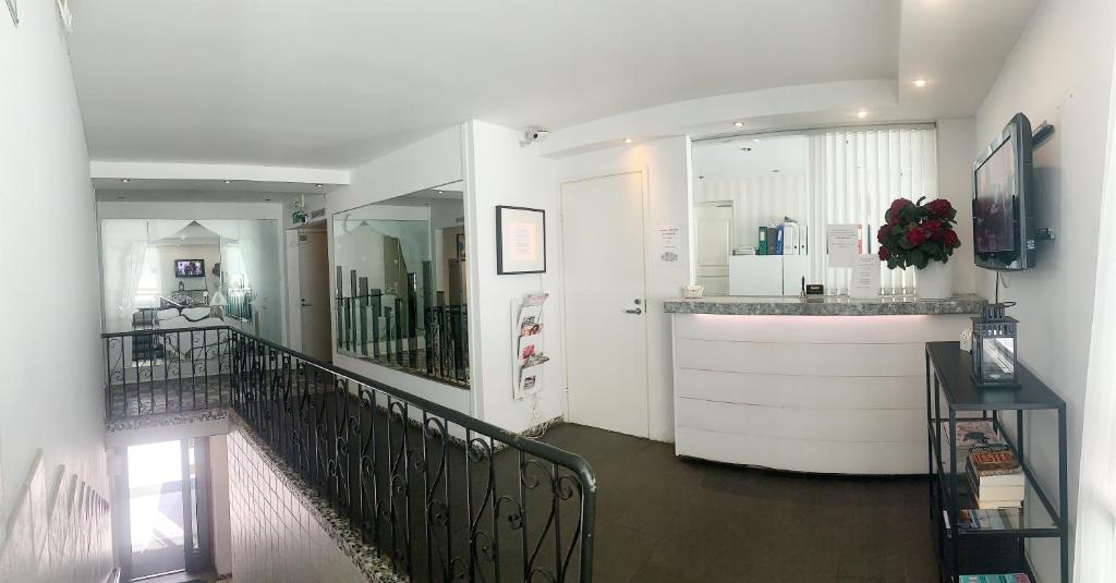 TV a/nebo společenská místnost v ubytování Hotel Harriet