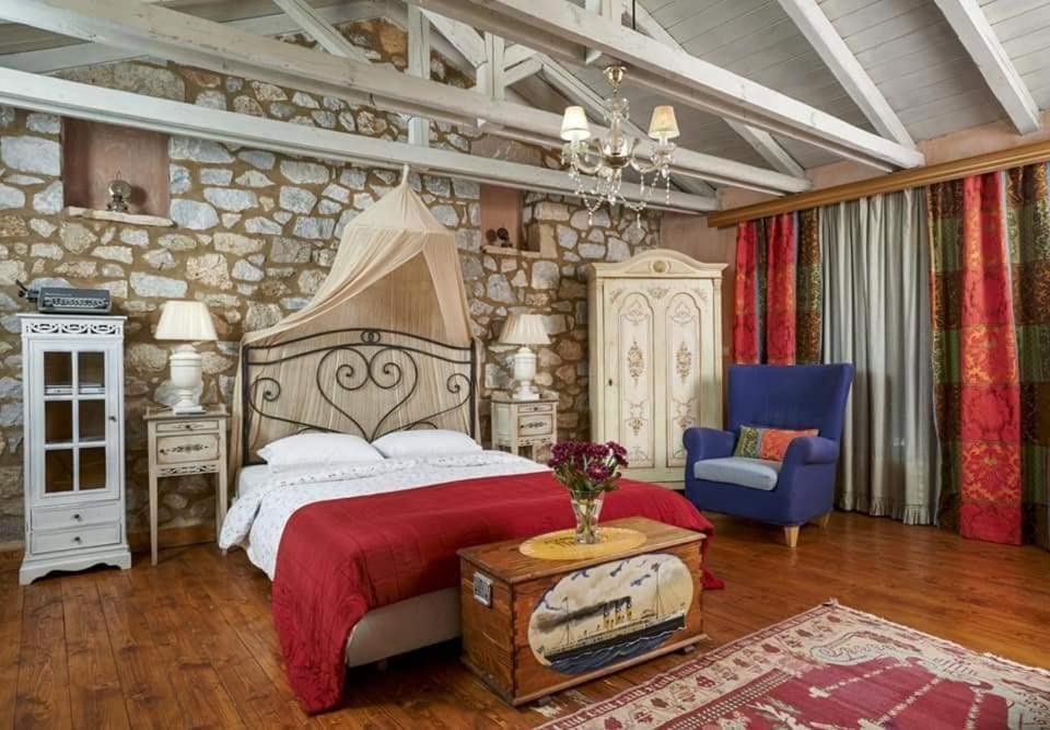 Tempat tidur dalam kamar di Elaion Guesthouse