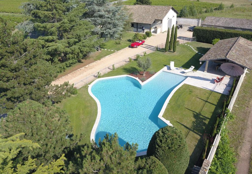 an overhead view of a swimming pool in a house at LE BEL AIR DE SAINT JEAN in Belleville-en-Beaujolais