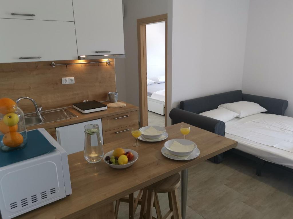 Postel nebo postele na pokoji v ubytování Apartments ZINA