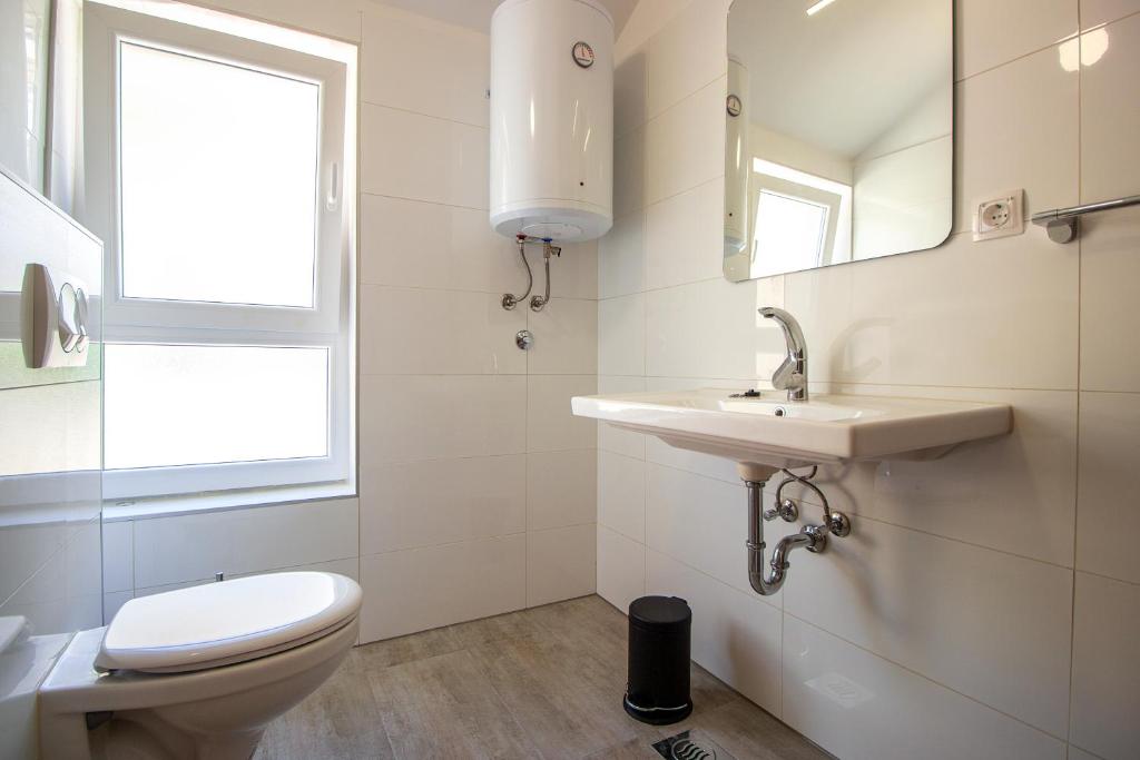 Koupelna v ubytování Apartments ZINA