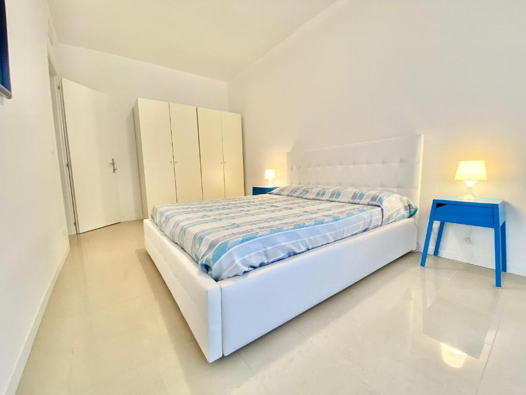 Postel nebo postele na pokoji v ubytování Appartamenti Mare Caorle