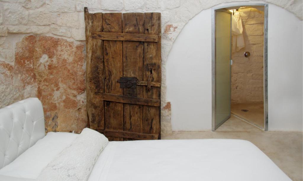 Postel nebo postele na pokoji v ubytování Puntebianche B&B