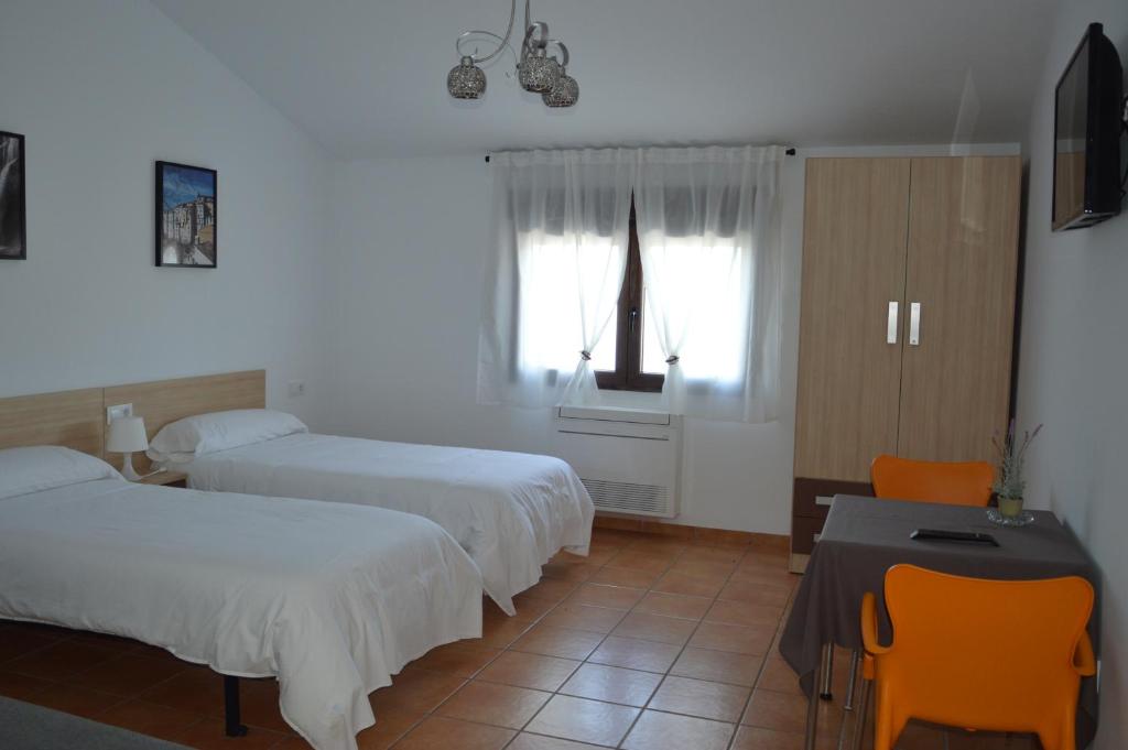 Postel nebo postele na pokoji v ubytování Rural Reillo Alojamientos Rurales