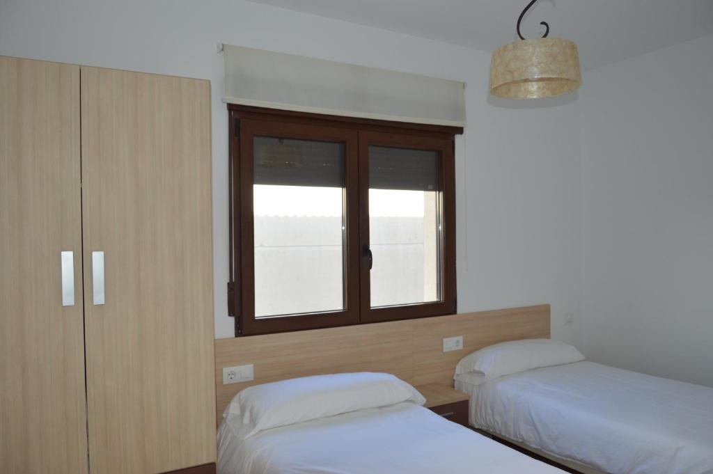 Postel nebo postele na pokoji v ubytování Rural Reillo Alojamientos Rurales