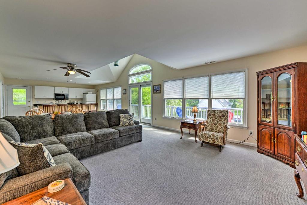 a living room with a couch and a table at Seaside Escape Less Than 1 Mi to Cape May Public Beach in West Cape May