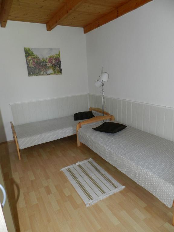 Postel nebo postele na pokoji v ubytování Penzion Lukov