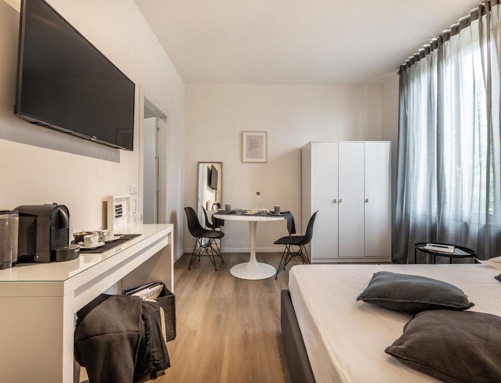 Postel nebo postele na pokoji v ubytování Emilia Suite Essence