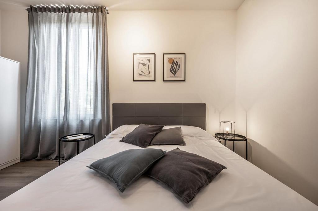 Postel nebo postele na pokoji v ubytování Emilia Suite Essence