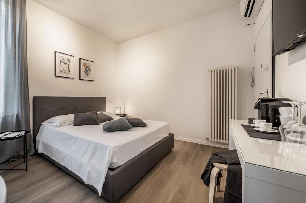 Postel nebo postele na pokoji v ubytování Emilia Suite Essence