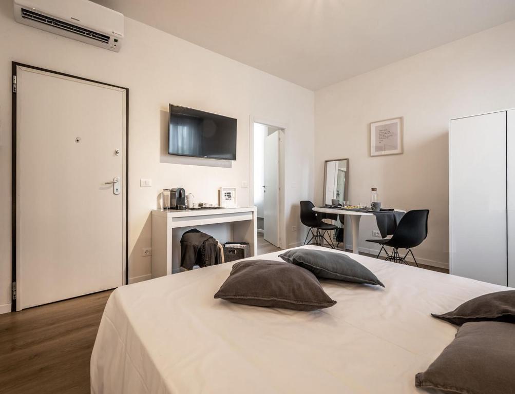 Postel nebo postele na pokoji v ubytování Emilia Suite Essence