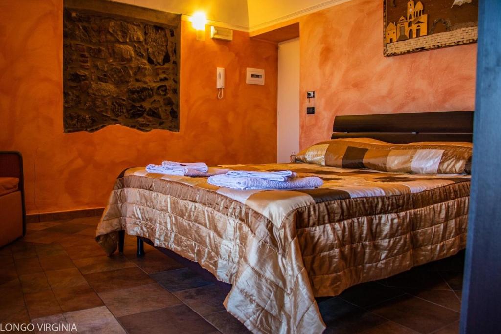 Posteľ alebo postele v izbe v ubytovaní B&B al centro storico