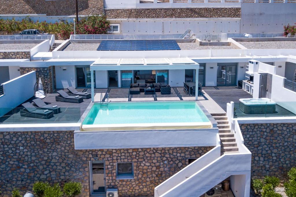 an overhead view of a swimming pool on a building at Blue Horizon in Lindos