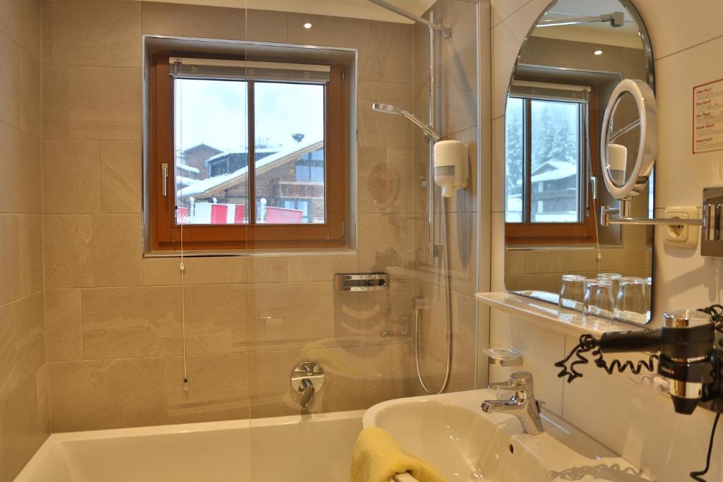 Koupelna v ubytování Aparthotel Acksteiner