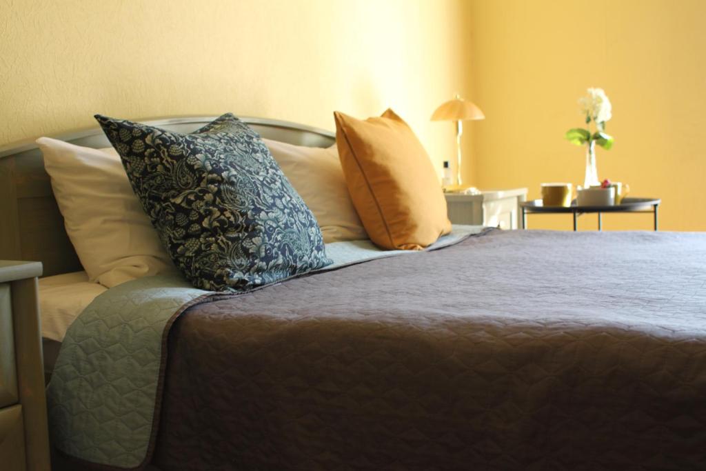 Postel nebo postele na pokoji v ubytování Sunflower B&B