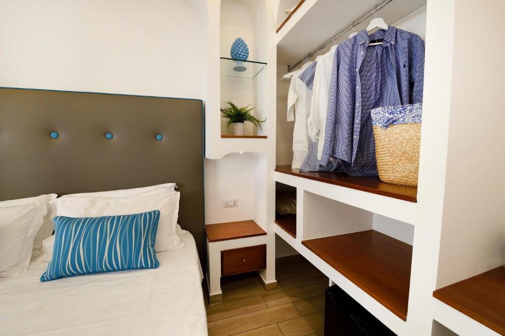 Posteľ alebo postele v izbe v ubytovaní Sorrento Rooms