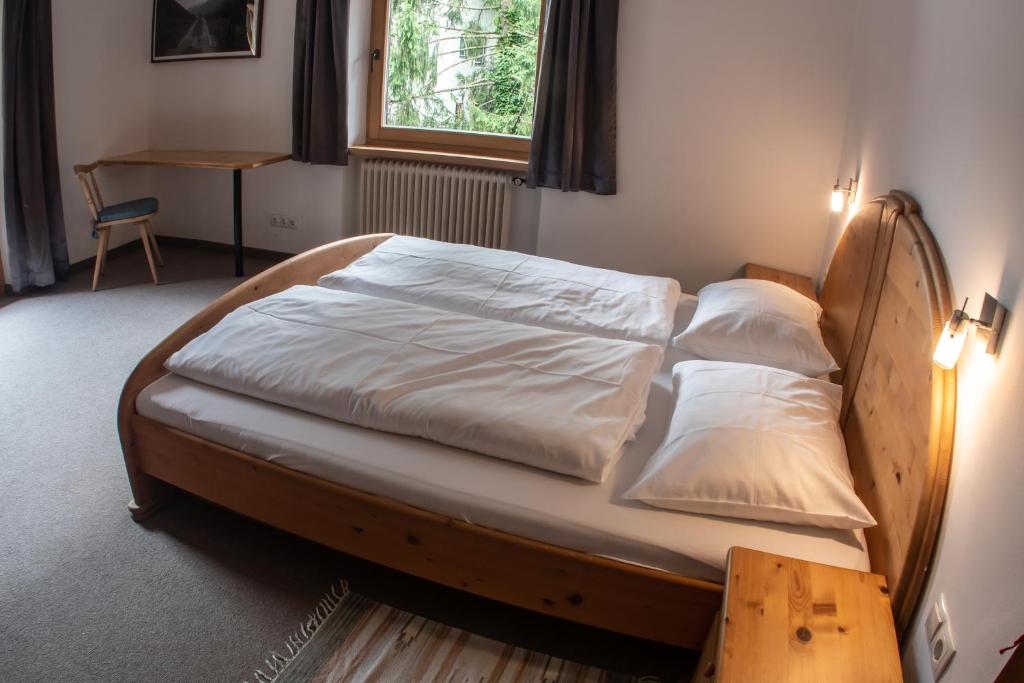 Postel nebo postele na pokoji v ubytování Haus Christophorus
