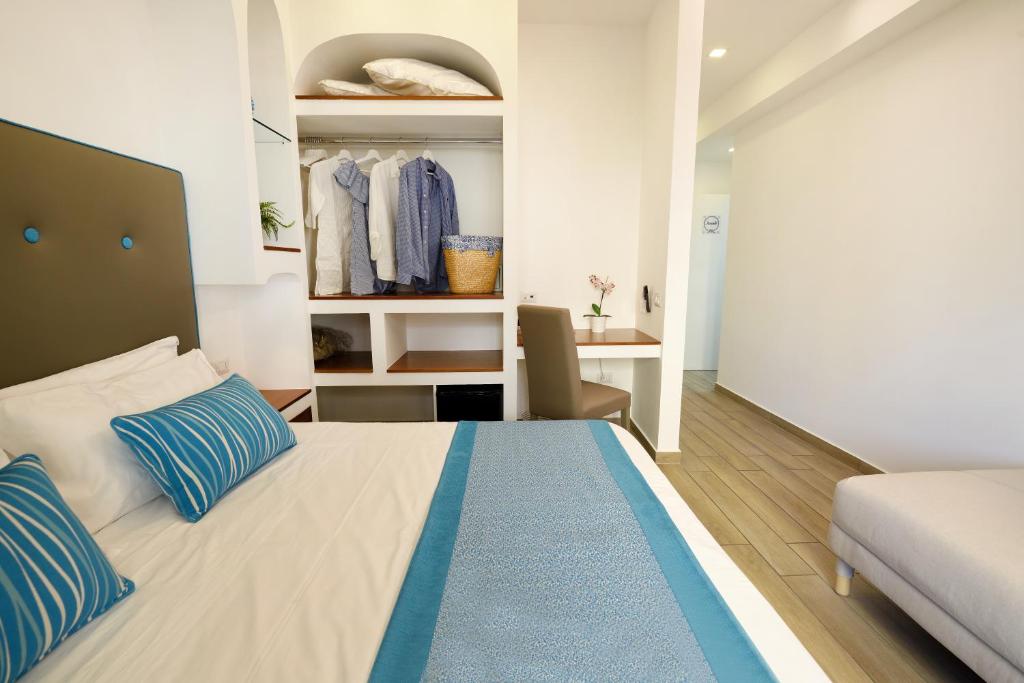 Posteľ alebo postele v izbe v ubytovaní Sorrento Rooms