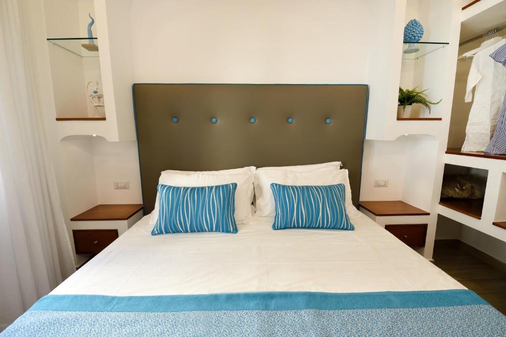 Posteľ alebo postele v izbe v ubytovaní Sorrento Rooms