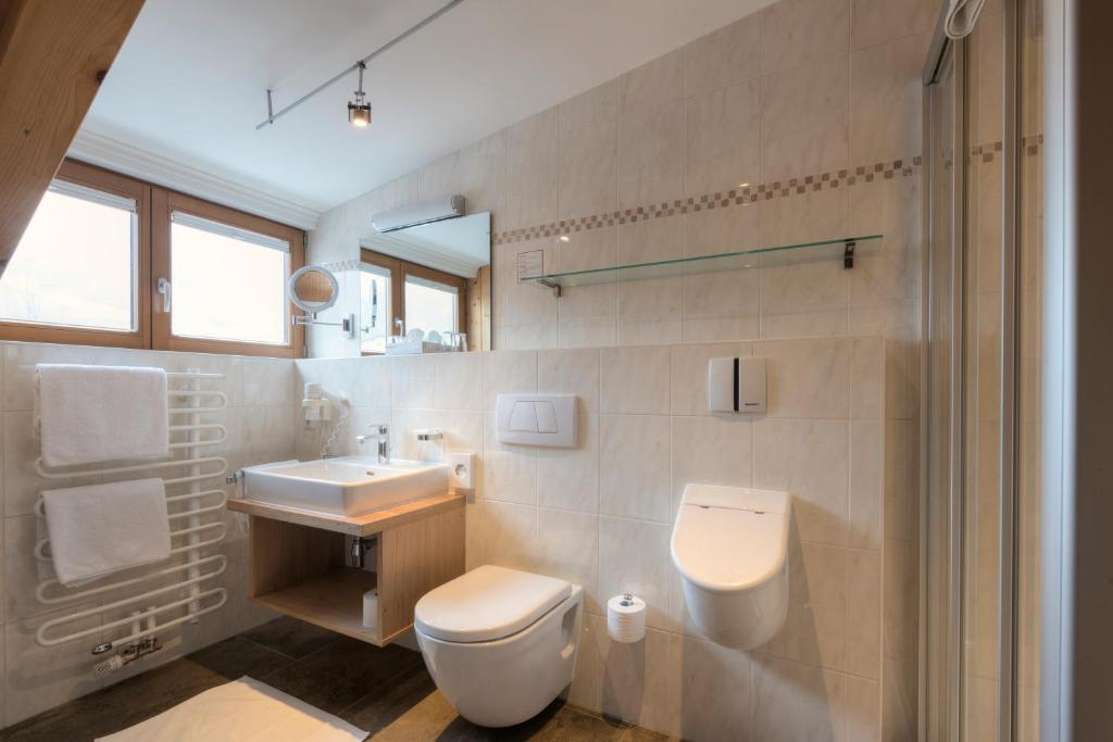 Koupelna v ubytování Aparthotel Acksteiner