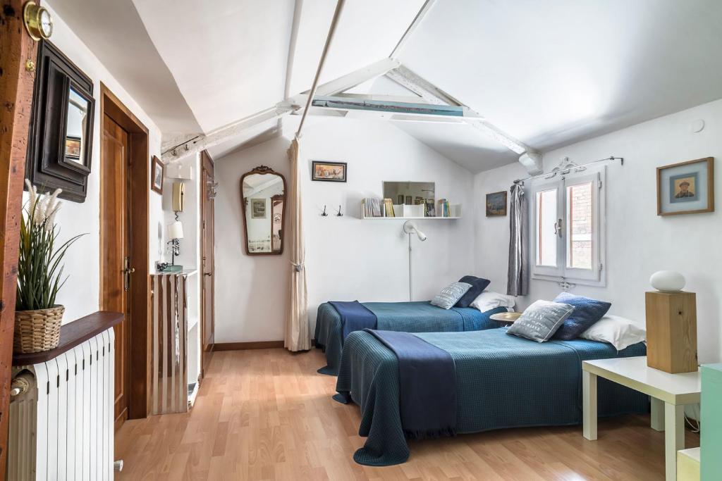 Posedenie v ubytovaní Ca Lorosa Cosy and comfortable Loft at Castello