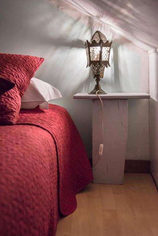 Posteľ alebo postele v izbe v ubytovaní Ca Lorosa Cosy and comfortable Loft at Castello