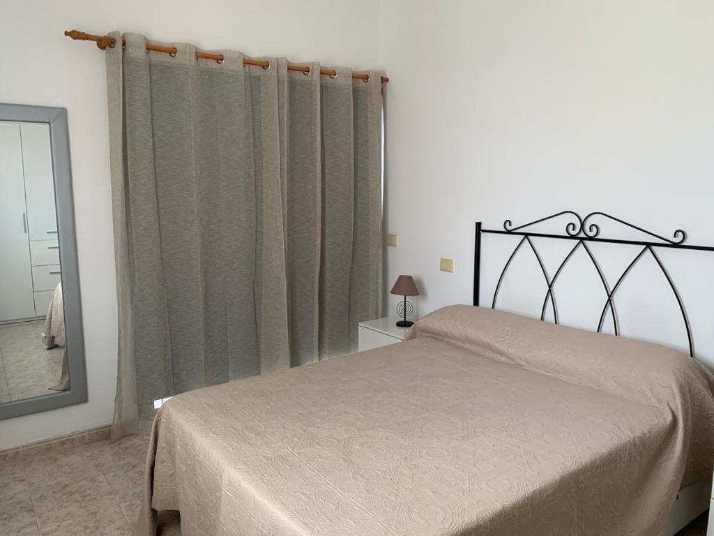 A bed or beds in a room at calle Eusebio Carballo II