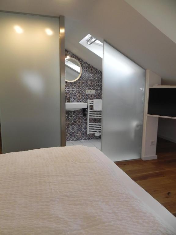 Postel nebo postele na pokoji v ubytování Milchhaus Zimmer - Tiny House