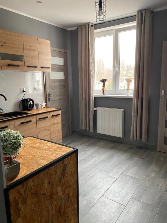 Kuchyňa alebo kuchynka v ubytovaní Apartamenty ToTuGdynia 6
