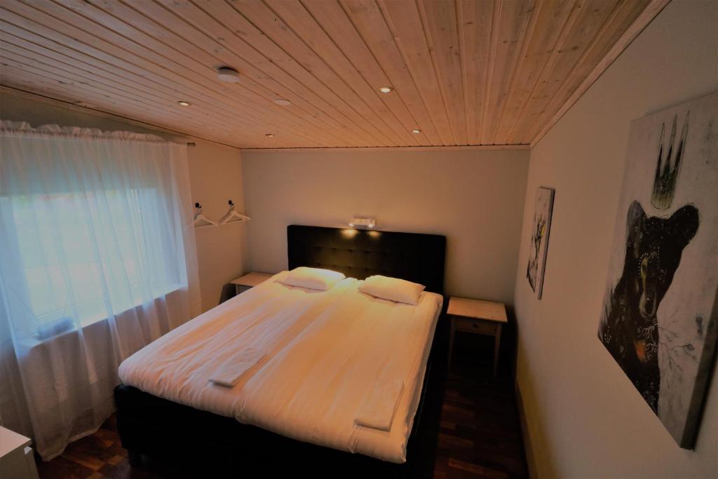 Postel nebo postele na pokoji v ubytování RIBO Apartment Aurora