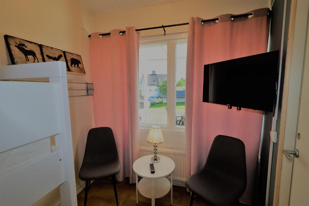 TV a/nebo společenská místnost v ubytování RIBO Apartment Aurora