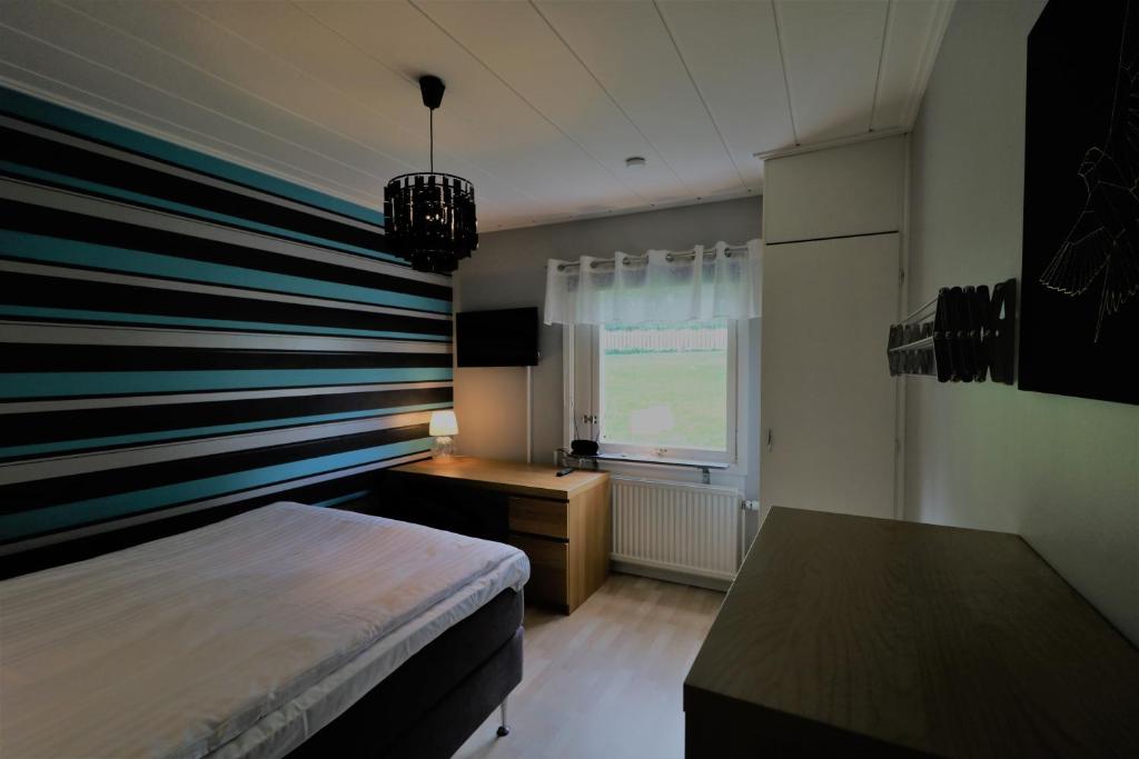 Postel nebo postele na pokoji v ubytování RIBO Apartment Aurora