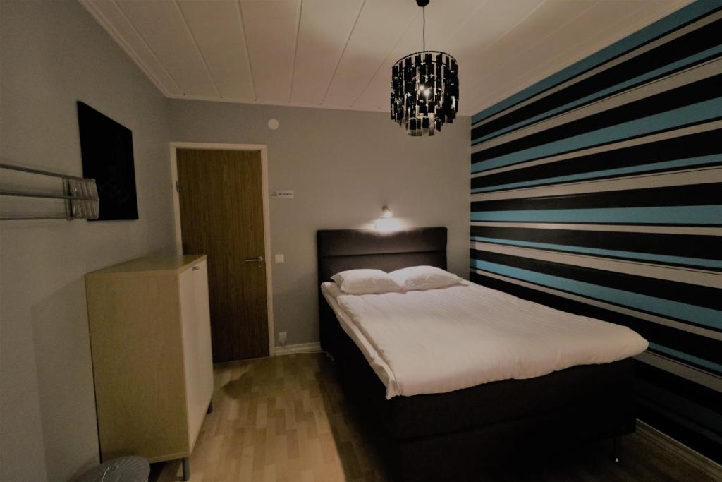 Postel nebo postele na pokoji v ubytování RIBO Apartment Aurora