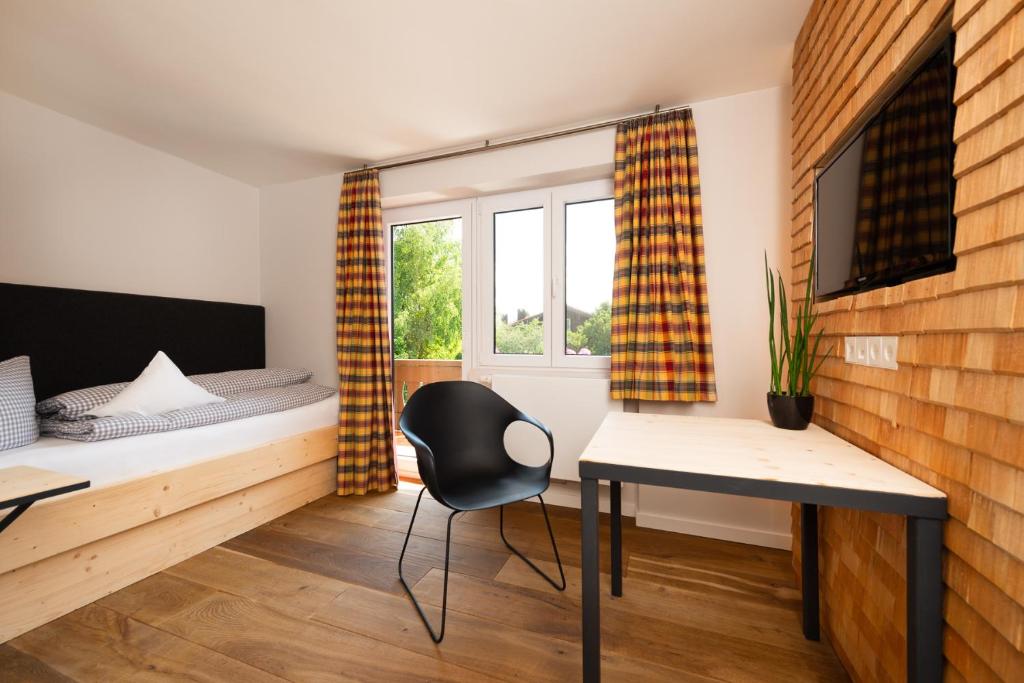 Postel nebo postele na pokoji v ubytování freistil Boutiquehotel