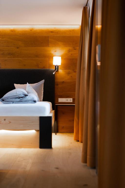 Postel nebo postele na pokoji v ubytování freistil Boutiquehotel