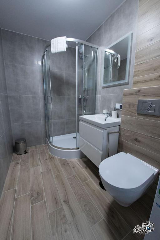 Kúpeľňa v ubytovaní Apartment & Room MARINA BORKI - Apartamenty RÓŻA WIATRÓW