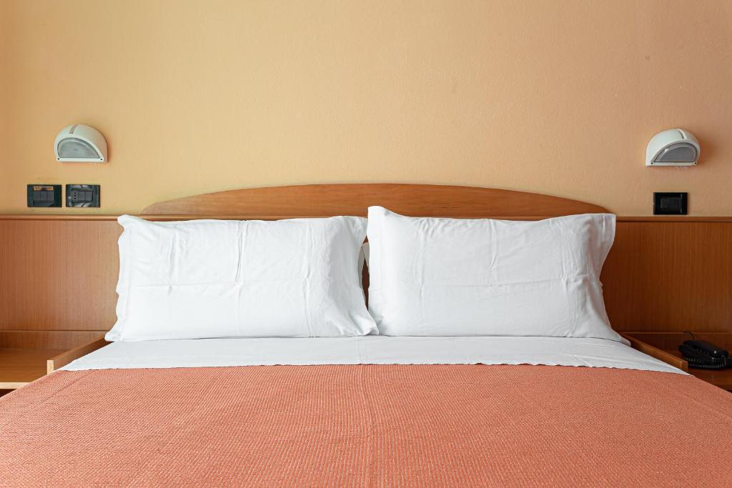 Postel nebo postele na pokoji v ubytování Little Hotel