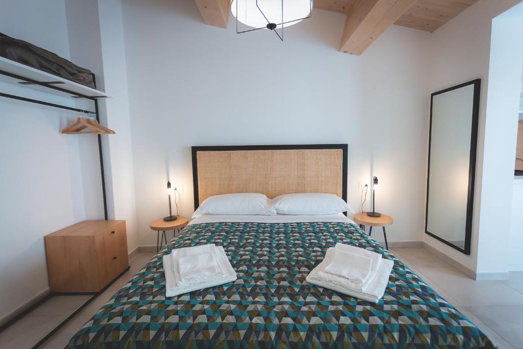 Posteľ alebo postele v izbe v ubytovaní Via Siena 4 - Suites & Rooms