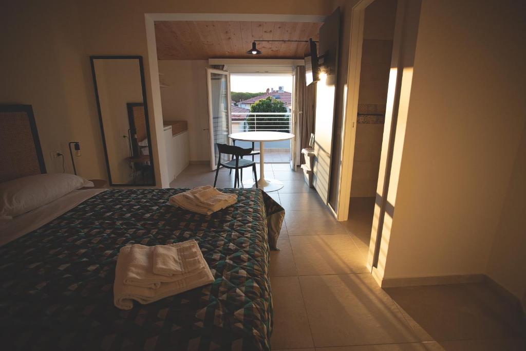 Posteľ alebo postele v izbe v ubytovaní Via Siena 4 - Suites & Rooms