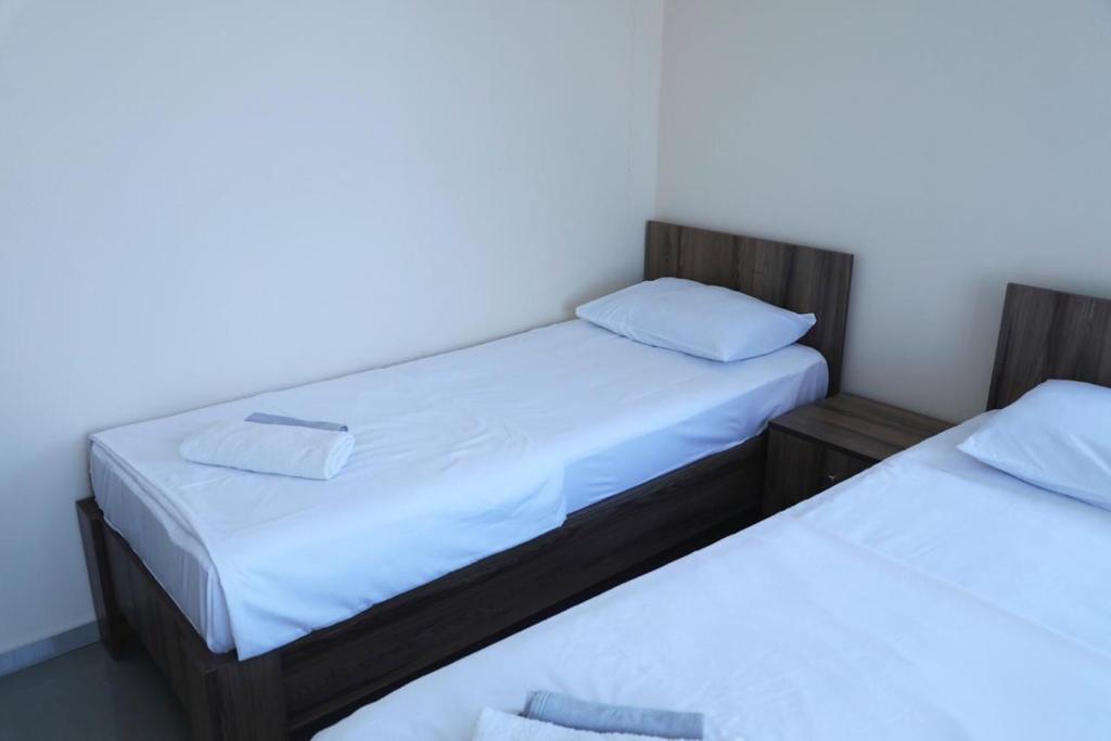 Rúm í herbergi á Hotel Estonia Two