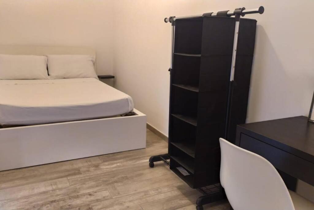 Łóżko lub łóżka w pokoju w obiekcie Domus 127 Apartment Pompei