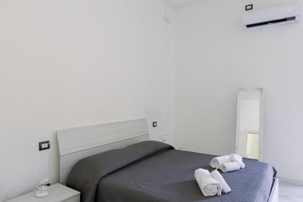 Postel nebo postele na pokoji v ubytování FG Vacanze