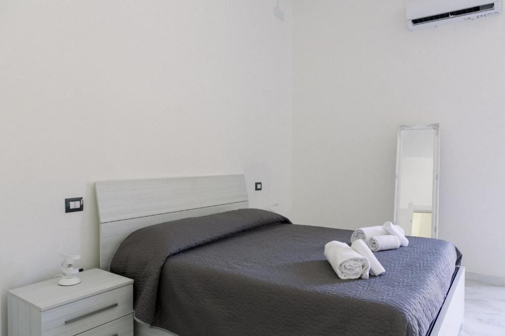 Postel nebo postele na pokoji v ubytování FG Vacanze