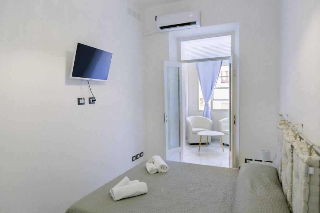 Postel nebo postele na pokoji v ubytování FG Vacanze